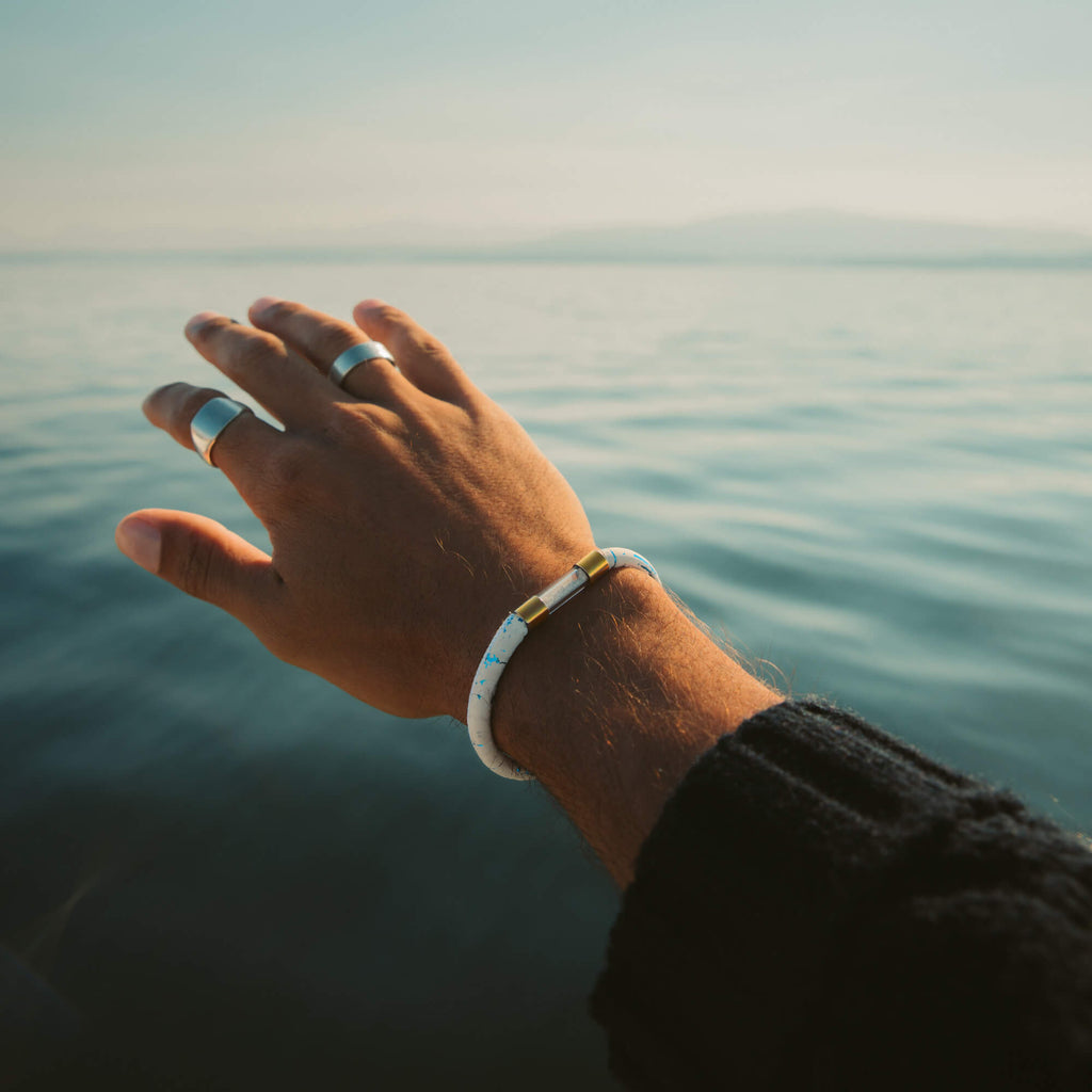 18k gold plated coral legend bracelet on a wrist
